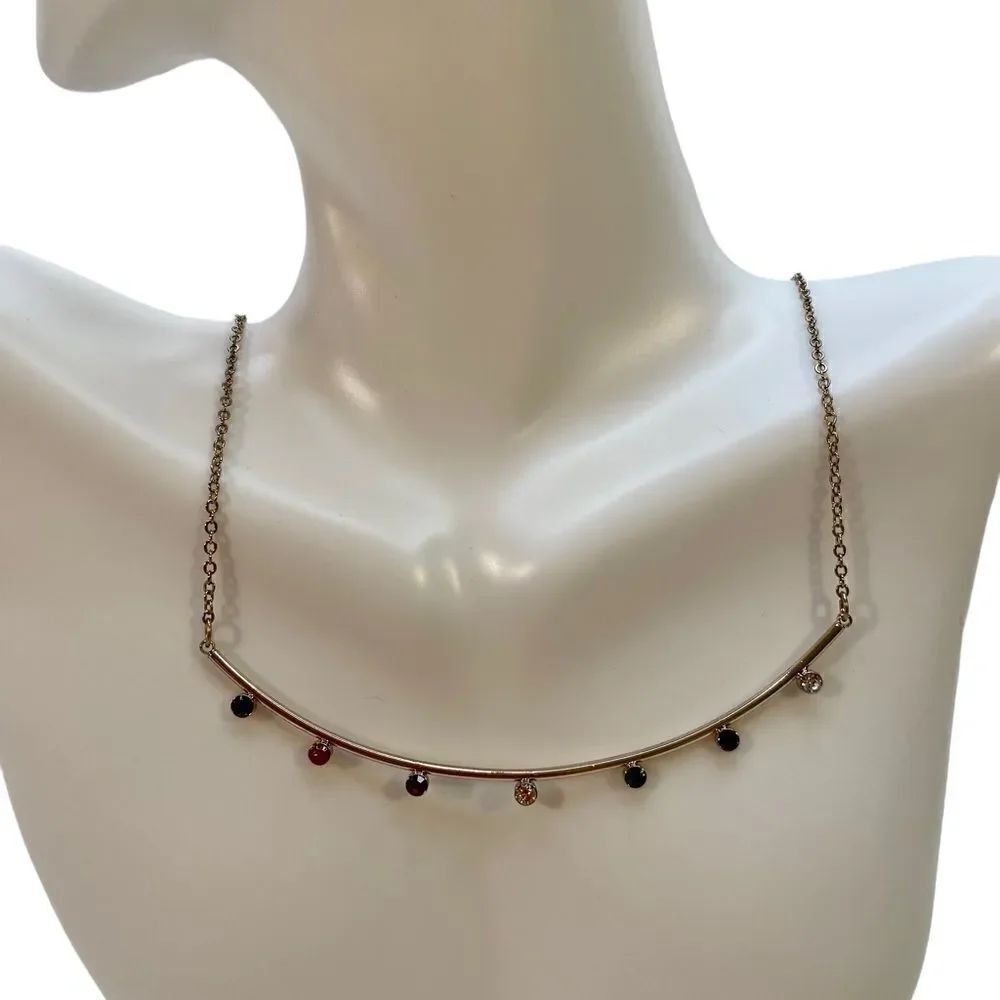 Loft multi-colored faux gemstone bar necklace on gold toned chain.
